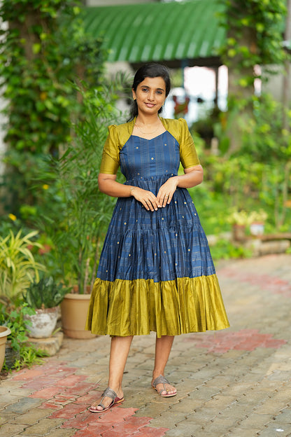 Full shot of woman wearing blue green raw silk midi dress for festive occasions