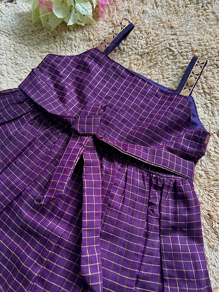 Back view of wine baby girl silk frock showing back tie waist ribbon