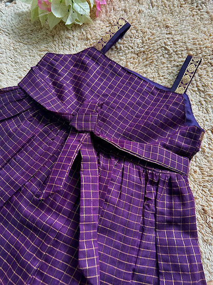 Back view of wine baby girl silk frock showing back tie waist ribbon