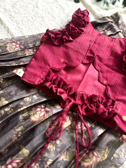 Close up of maroon raw silk crop top with zari stripes and back tie-up