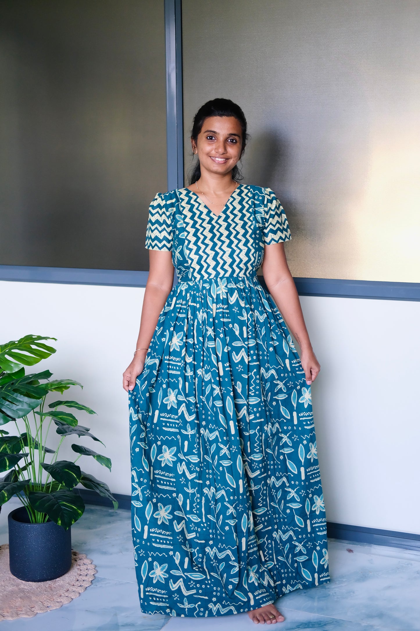 Full-length view of a comfortable ladies cotton nighty in teal blue