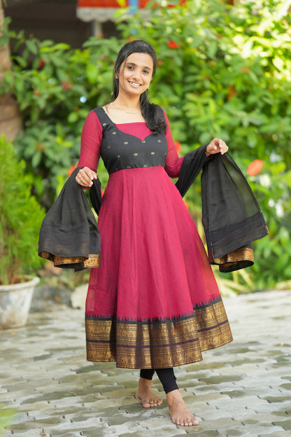 Red and black ethnic anarkali suit with traditional woven border