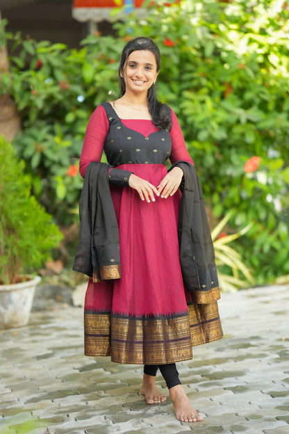 Front view of red and black cotton anarkali suit set