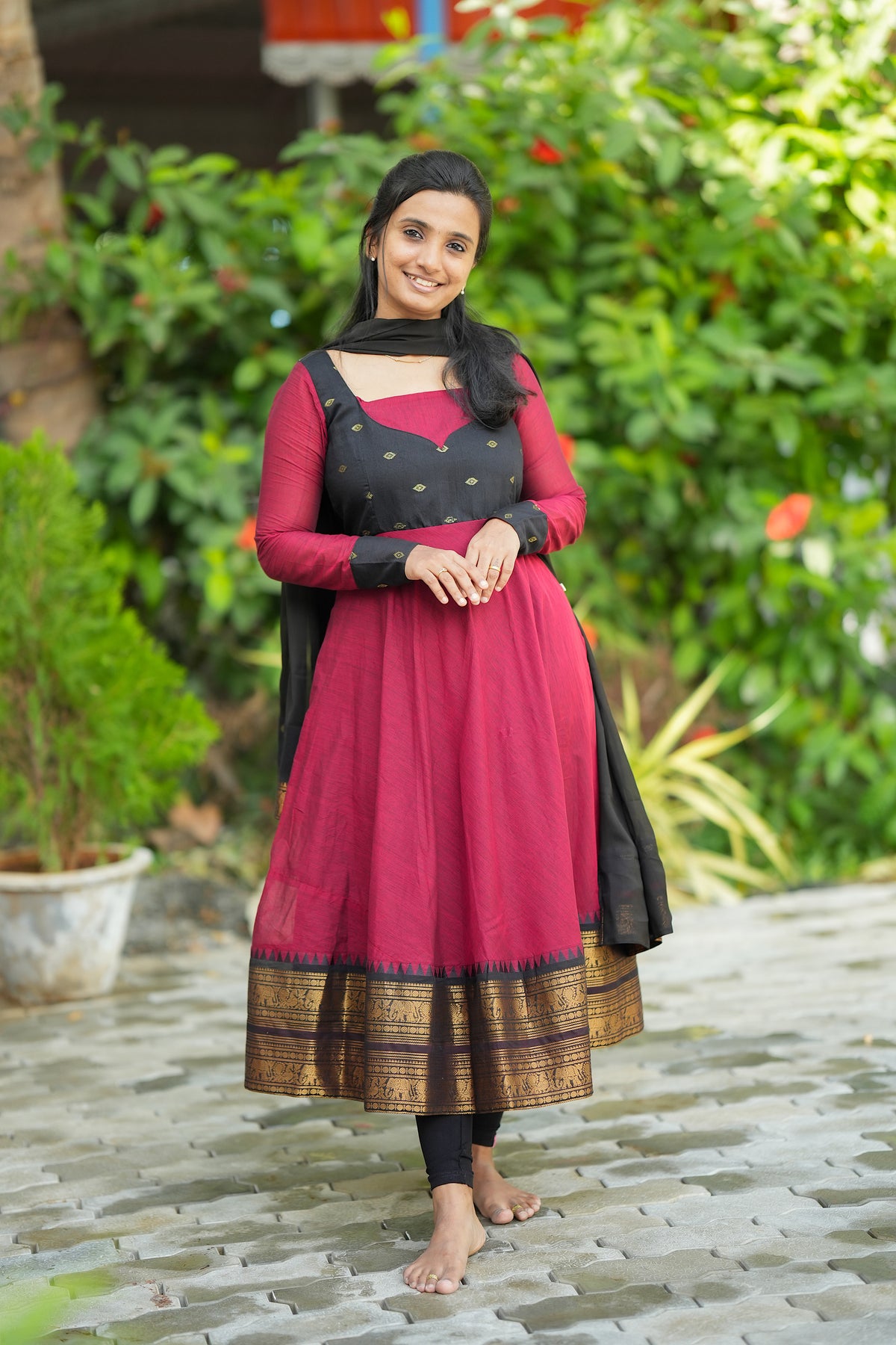 Elamathi red cotton anarkali suit set with black yoke and dupatta