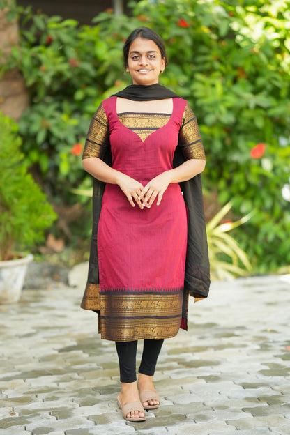 Red Chettinad cotton kurti set with dupatta featuring traditional gold zari borders with elephant motifs.