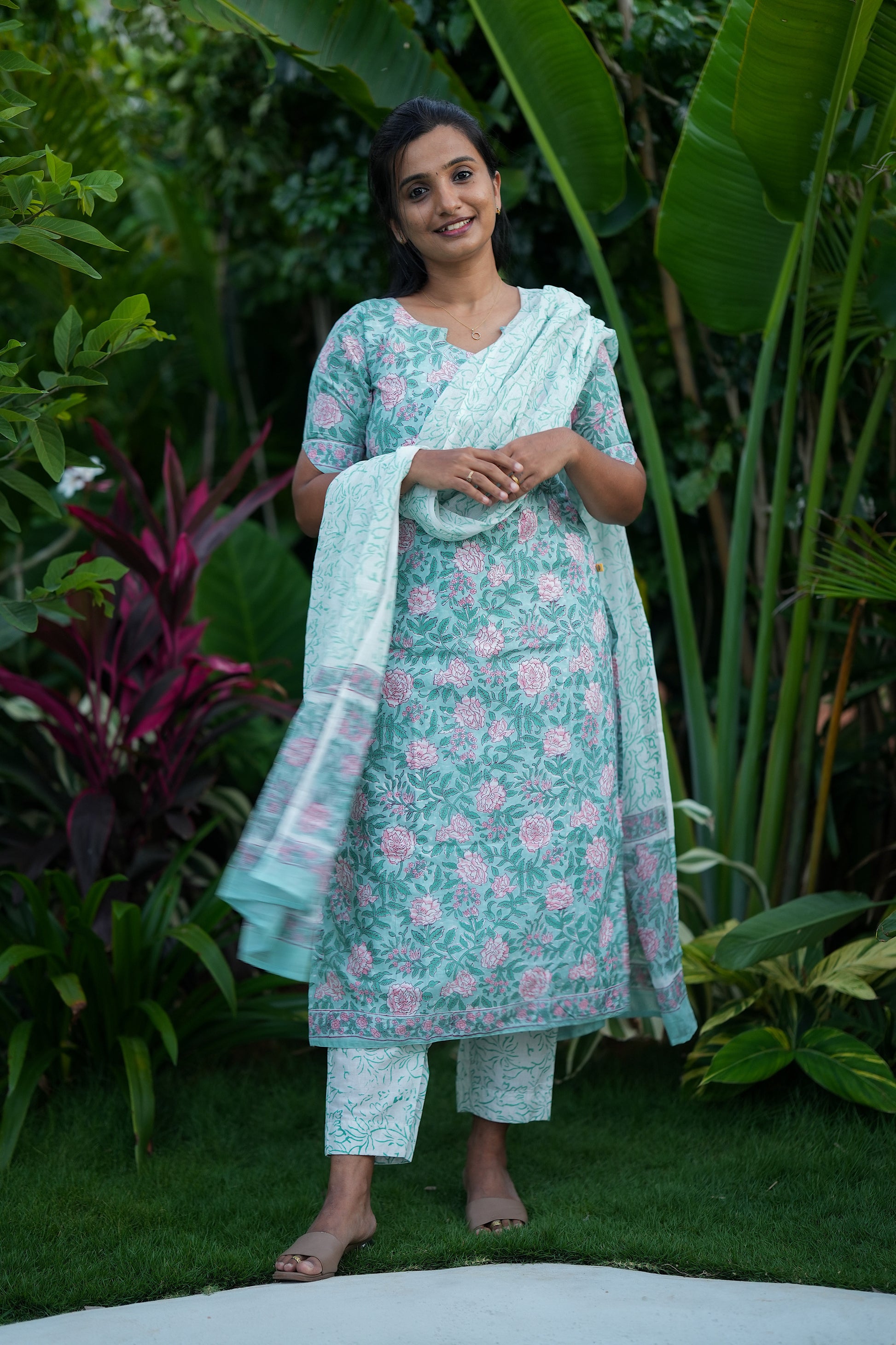 Women's printed cotton kurti set in pastel mint green with straight pants