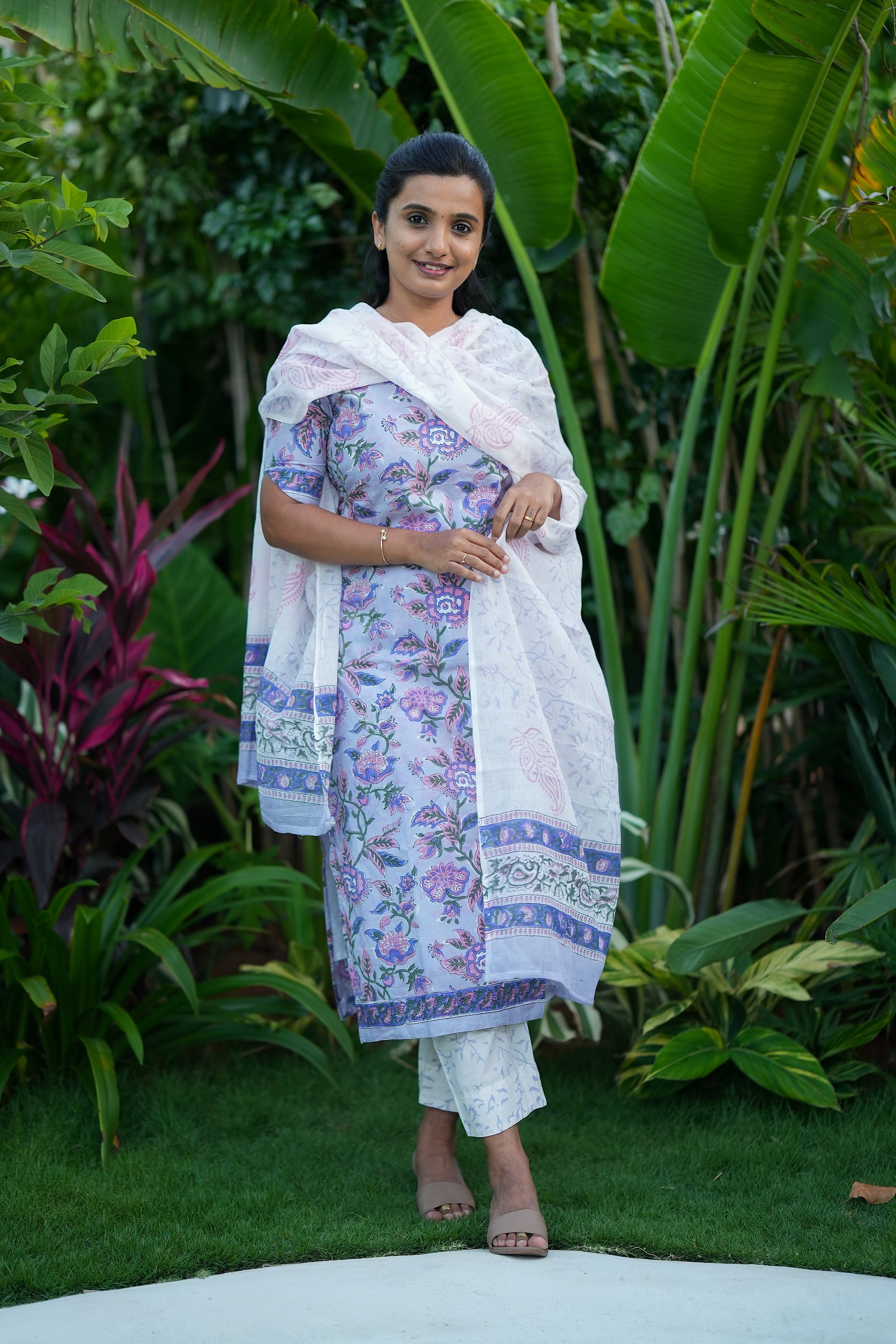 Akila lavender printed cotton kurti set for women, highlighting the comfortable fit and elegant design.