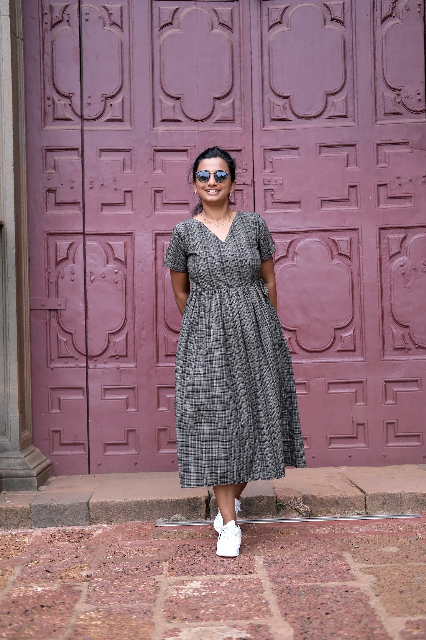 Black handloom cotton wrap dress with fine checkered pattern and V-neckline