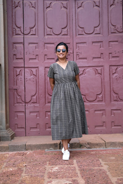 Black handloom cotton wrap dress with fine checkered pattern and V-neckline