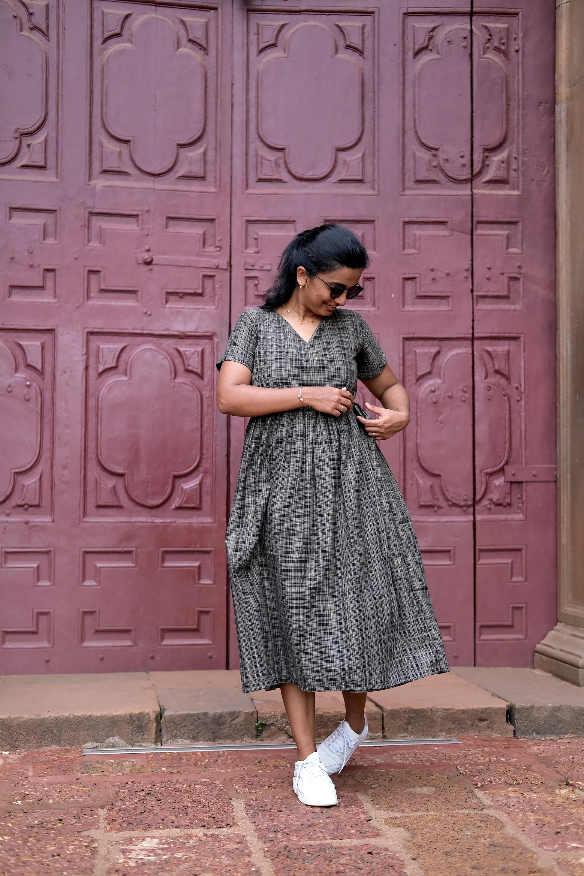 Feeding friendly midi dress showing the side tie-up wrap closure detail