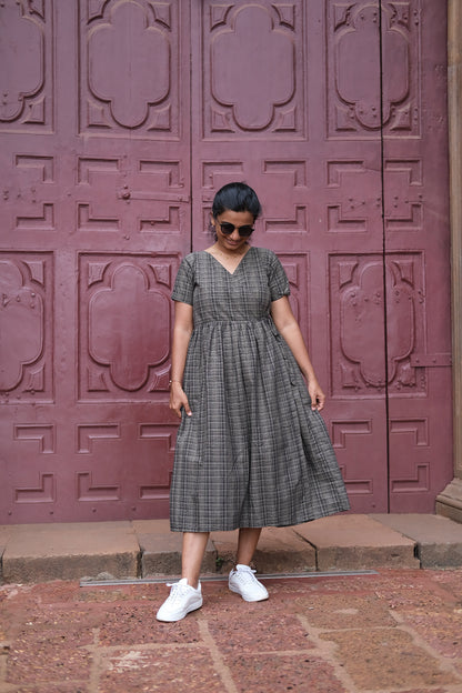 Midi length cotton wrap dress in black and grey checks with gathered waist