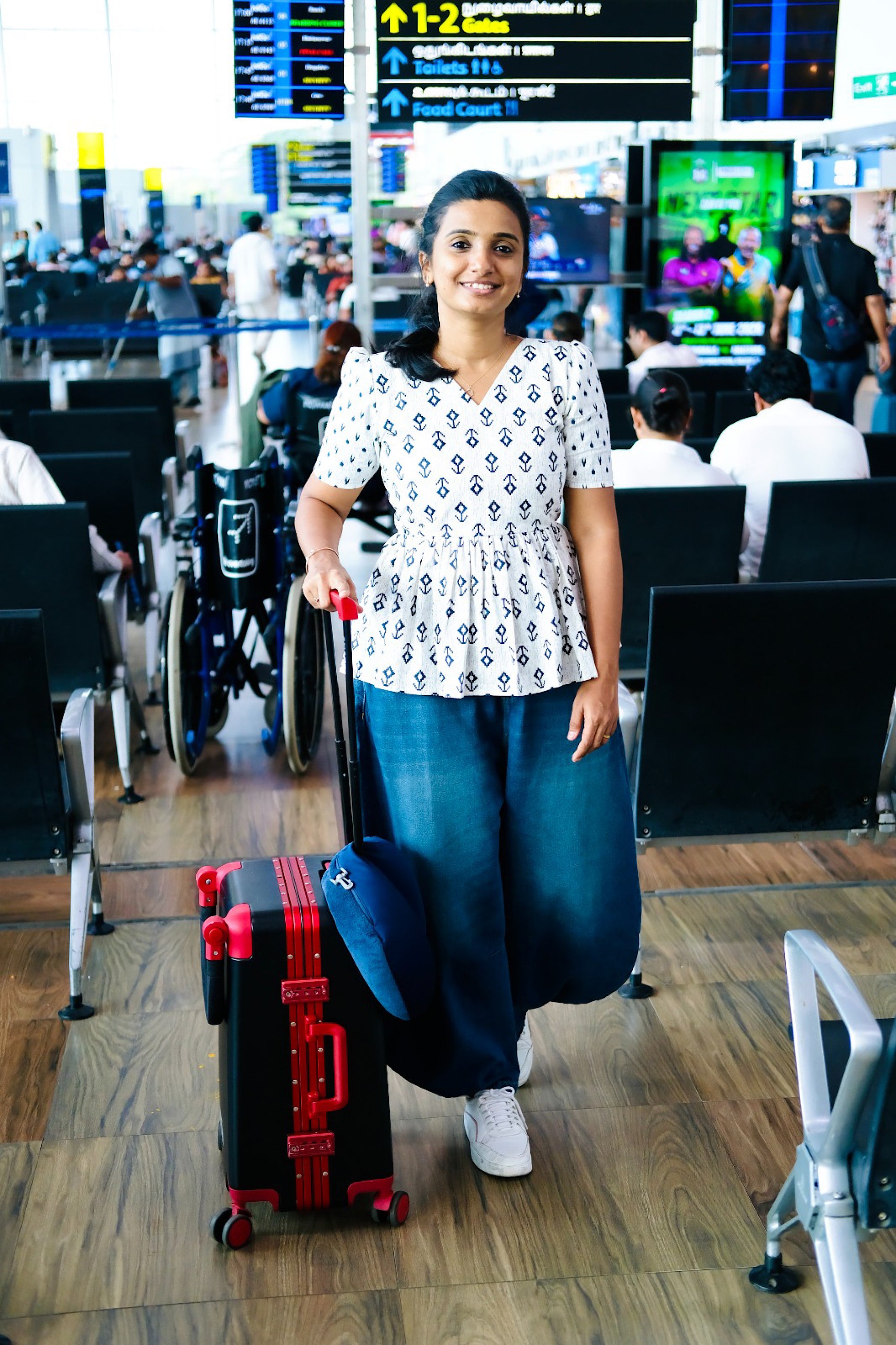 Off-white cotton peplum top with dark blue ikat print