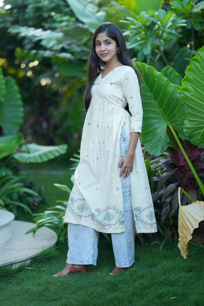 Side view of the off-white handloom cotton alia cut kurti showing the side slit and gathers