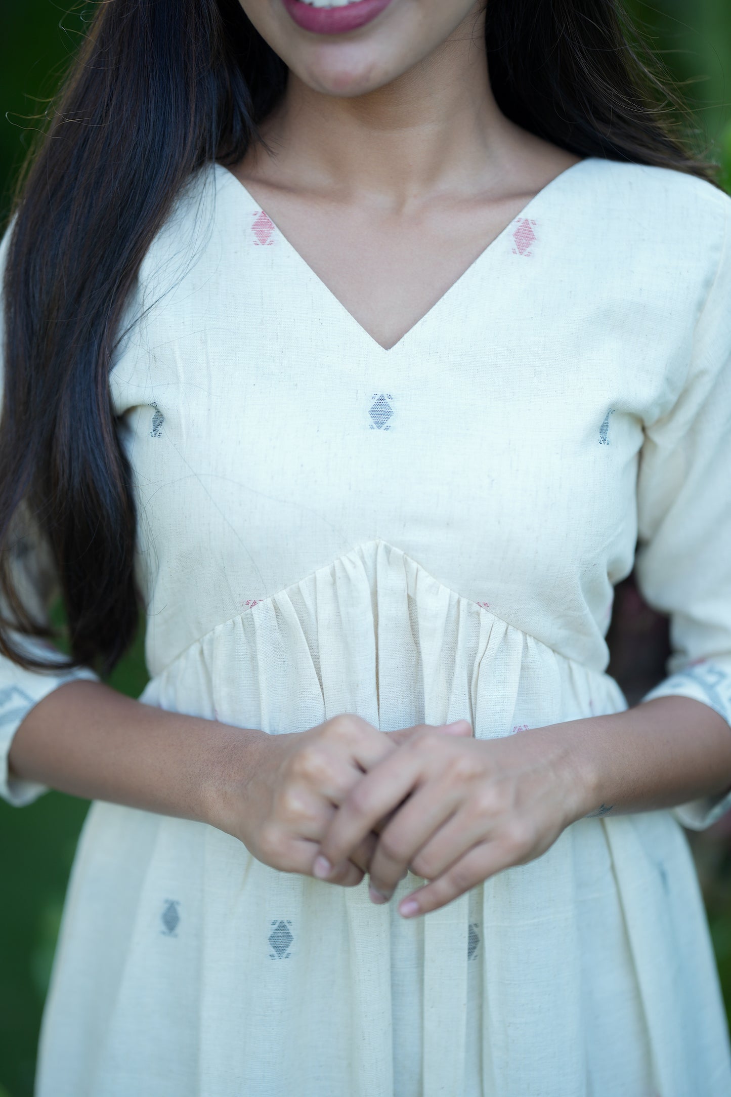 Close-up of the textured handloom cotton fabric and V-neck design of the alia cut kurti