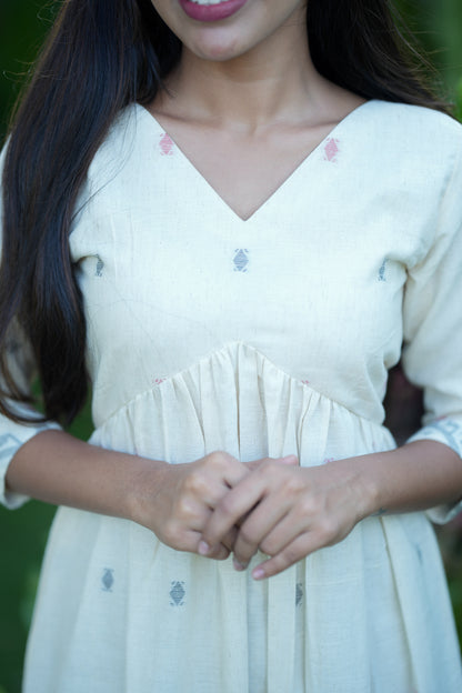 Close-up of the textured handloom cotton fabric and V-neck design of the alia cut kurti