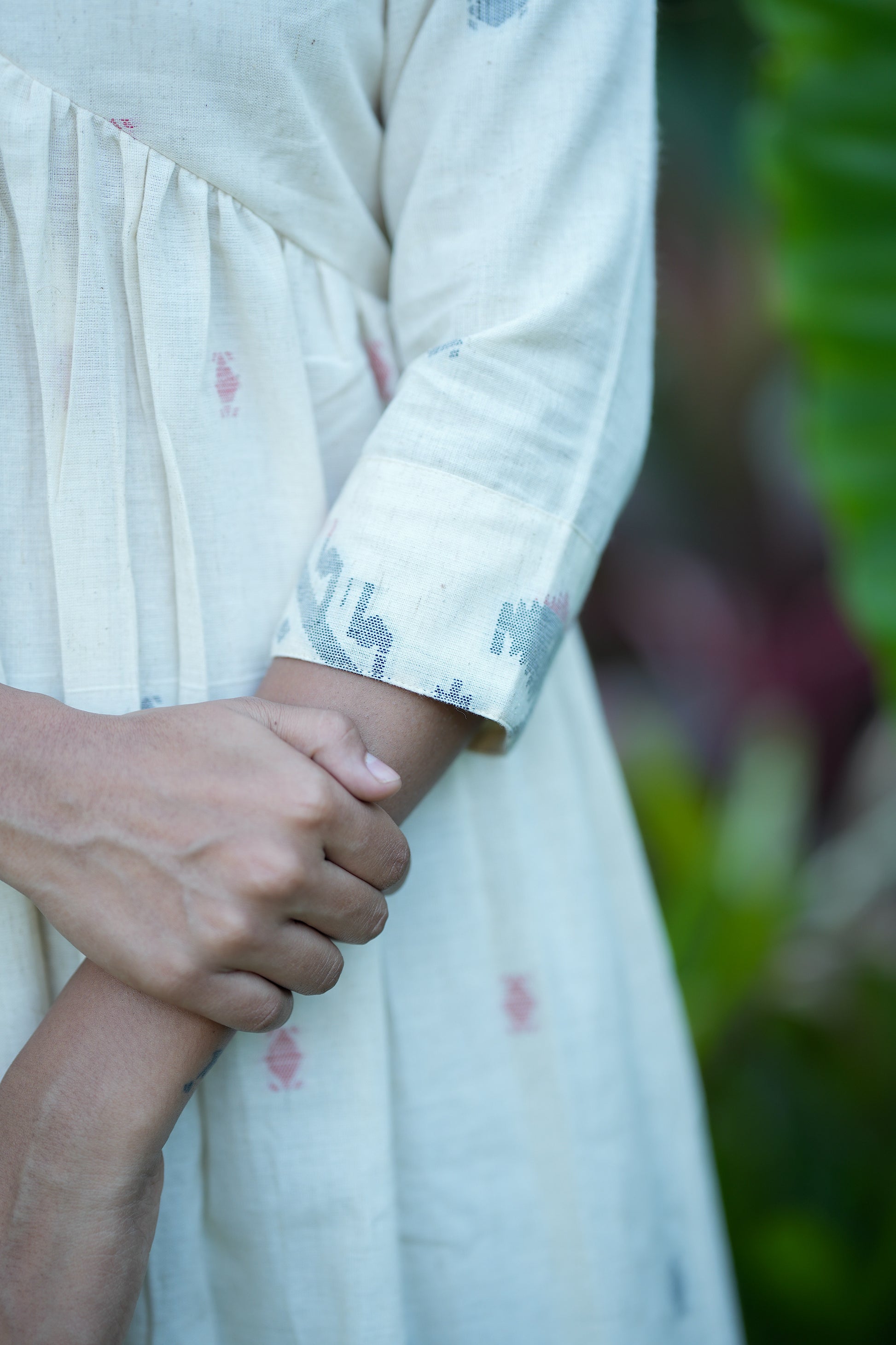 Close-up of the sleeve cuff with geometric border print on the Pranika cotton kurti