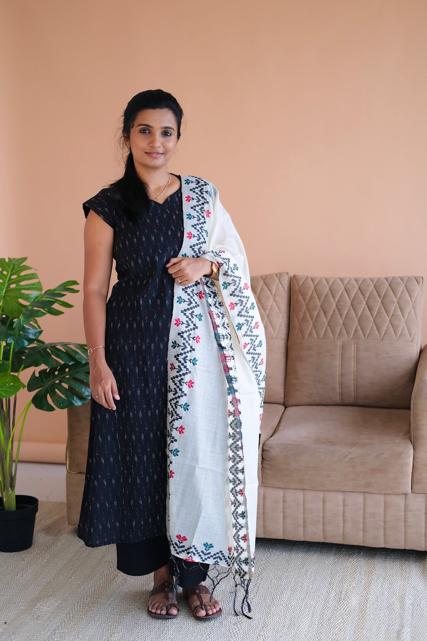 ikat kurti set with dupatta - Black cotton A-line kurti with a white jacquard dupatta featuring geometric borders
