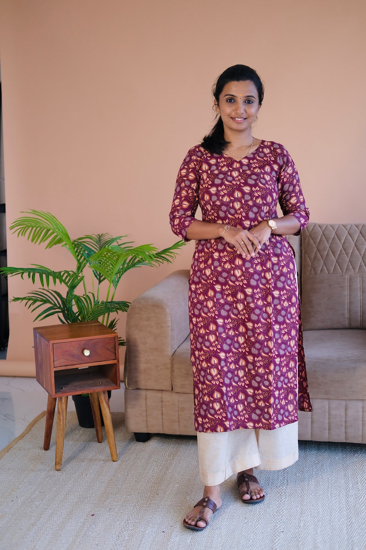 Front view of Tanisha plum cotton kurti for women with round neck