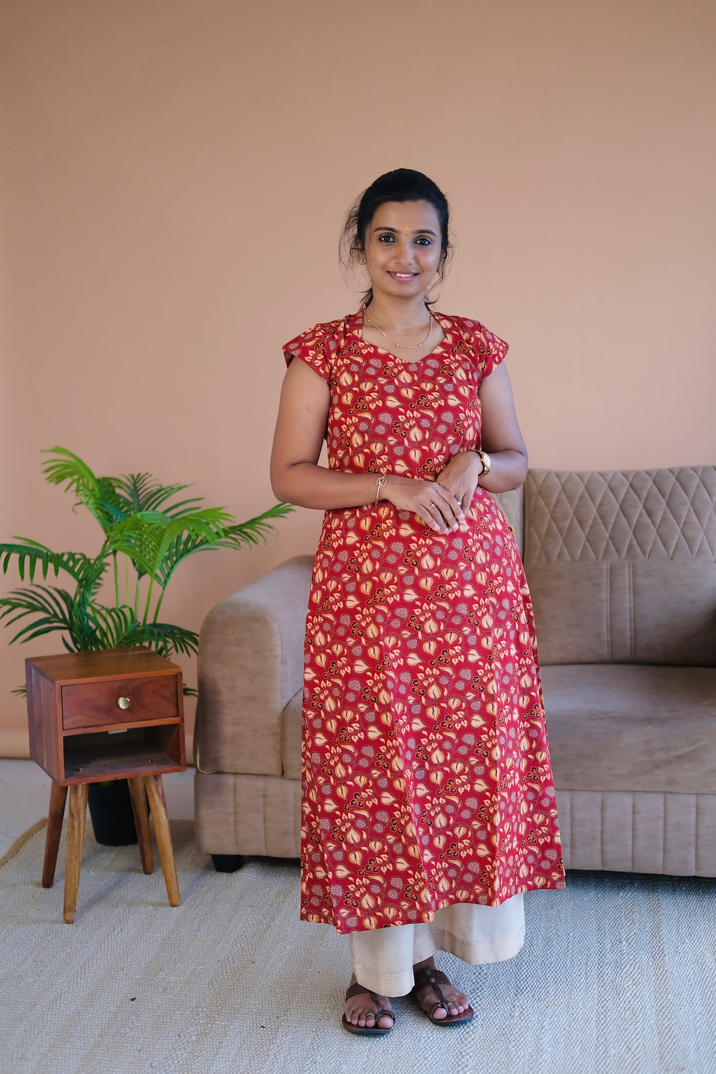 Red printed cotton a line kurti with short cap sleeves and round neck