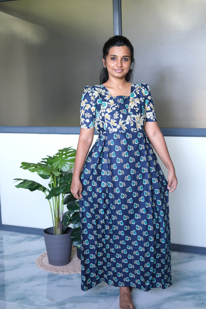 Full-length front view of the dark blue cotton maxi nighty draped elegantly, highlighting the comfortable flared silhouette.