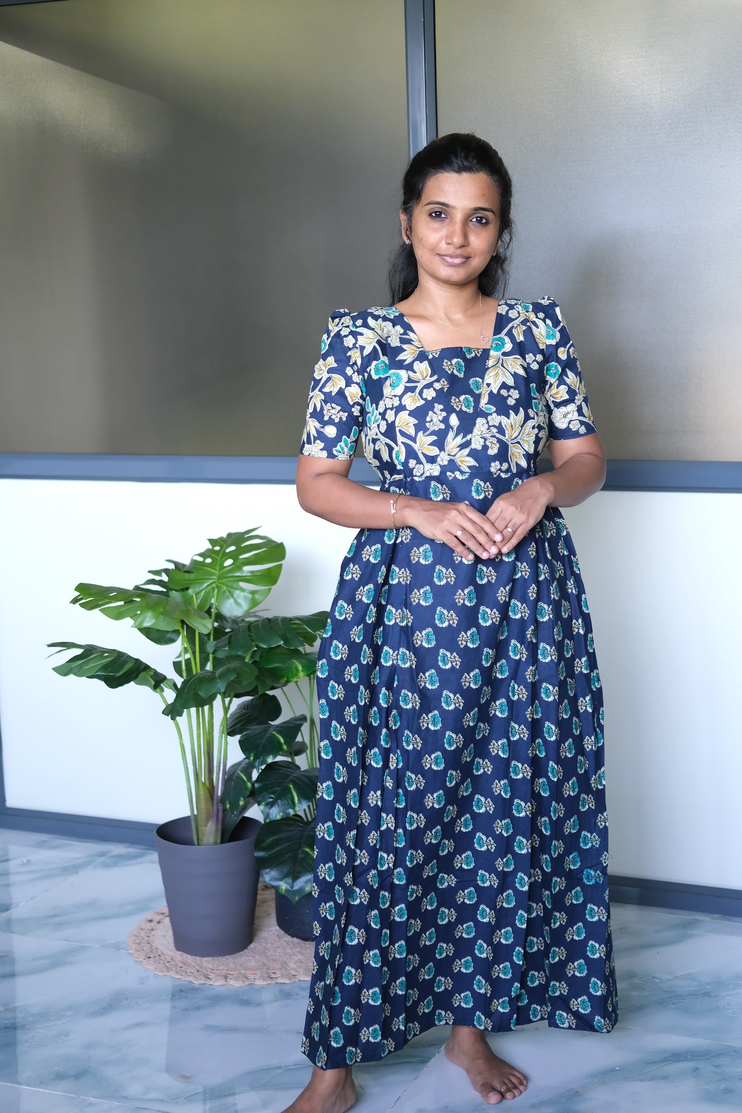 Dark blue cotton maxi nighty featuring a square neckline, short sleeves with gathered shoulders, and a relaxed ankle-length fit.