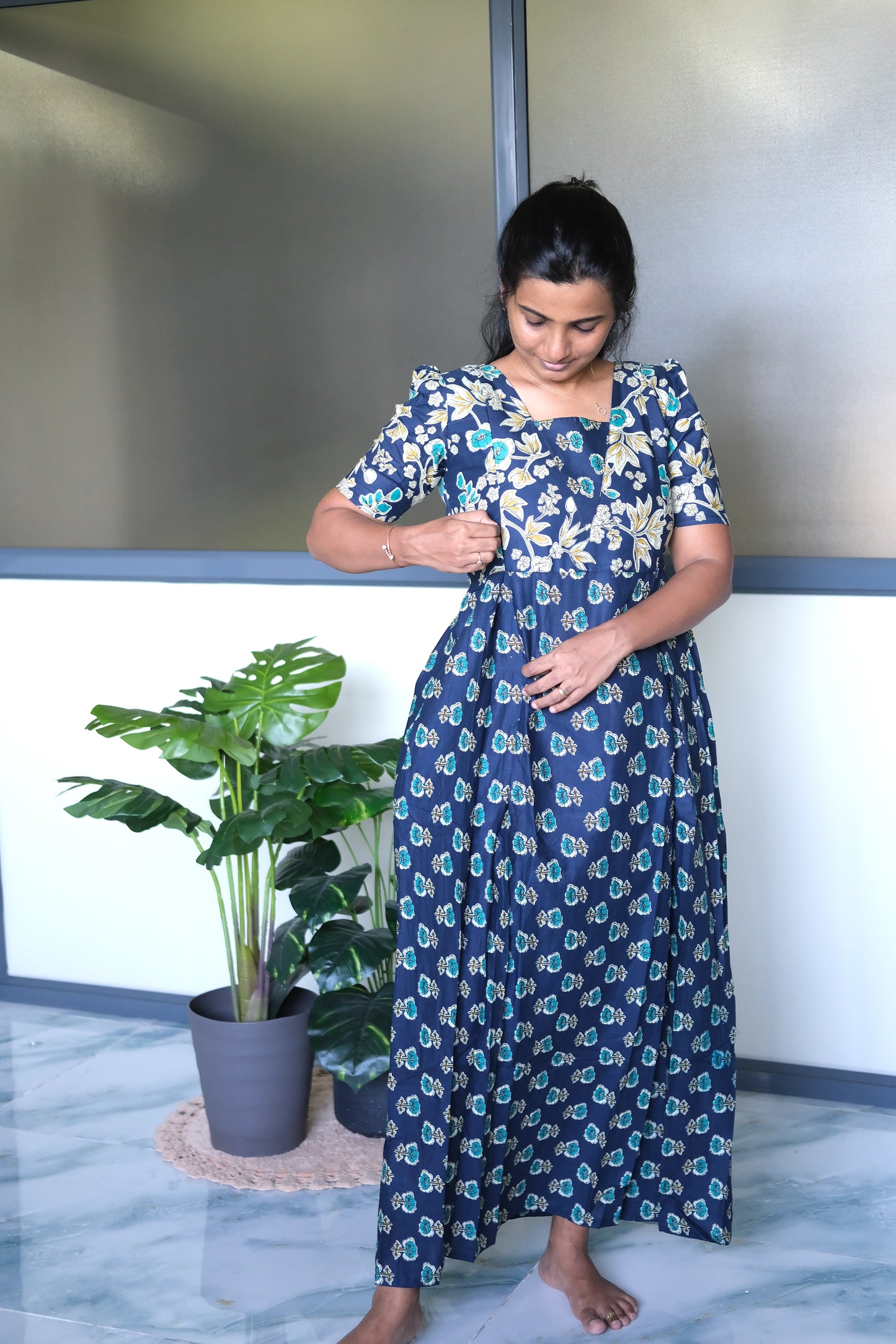 Dark blue feeding nighty cotton fabric showing the concealed vertical zip closures on the front bust for nursing convenience.