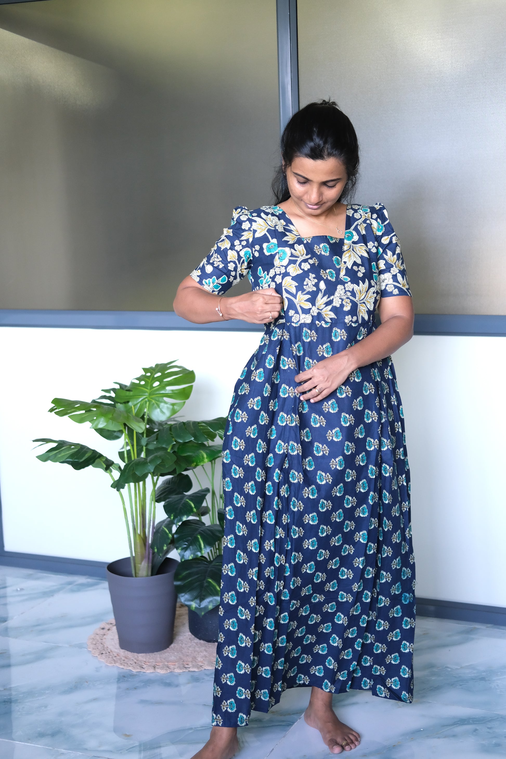 Dark blue feeding nighty cotton fabric showing the concealed vertical zip closures on the front bust for nursing convenience.