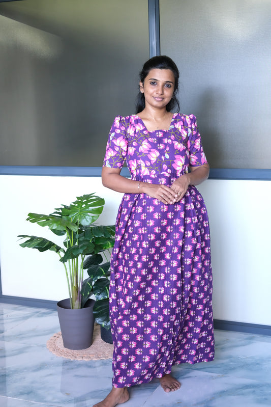 Violet cotton maxi nighty with a square neckline and short puff sleeves.