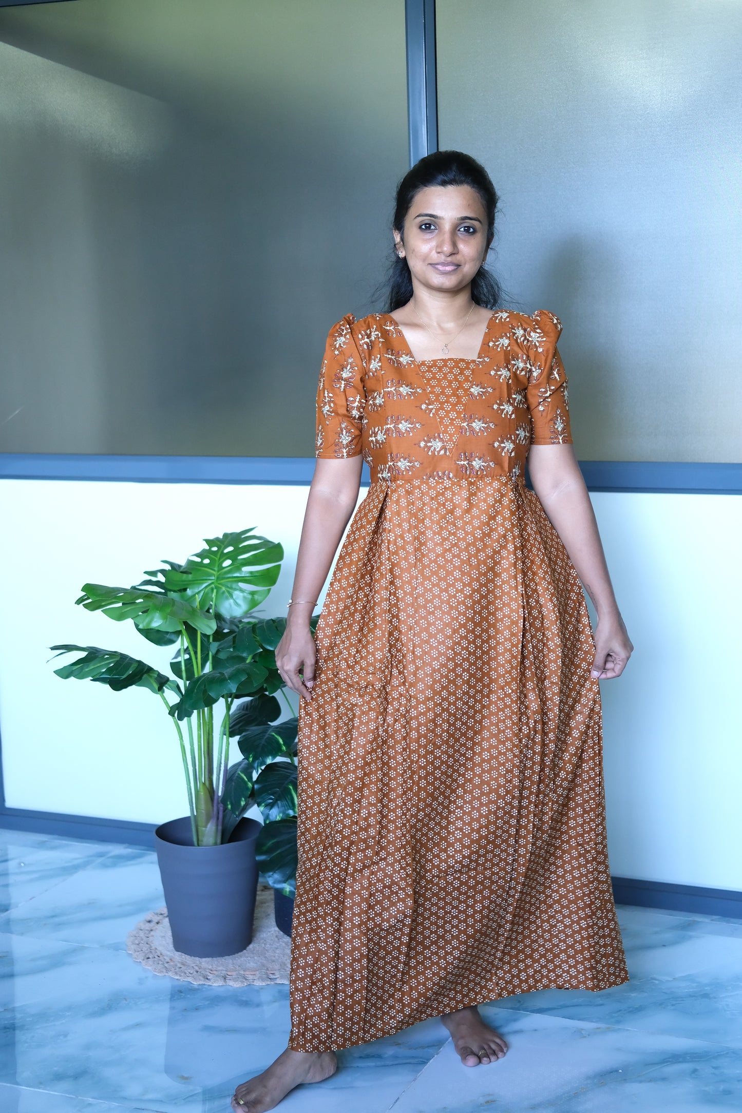 Ankle-length mustard cotton nighty with zip featuring a relaxed gathered waist and comfortable drape.