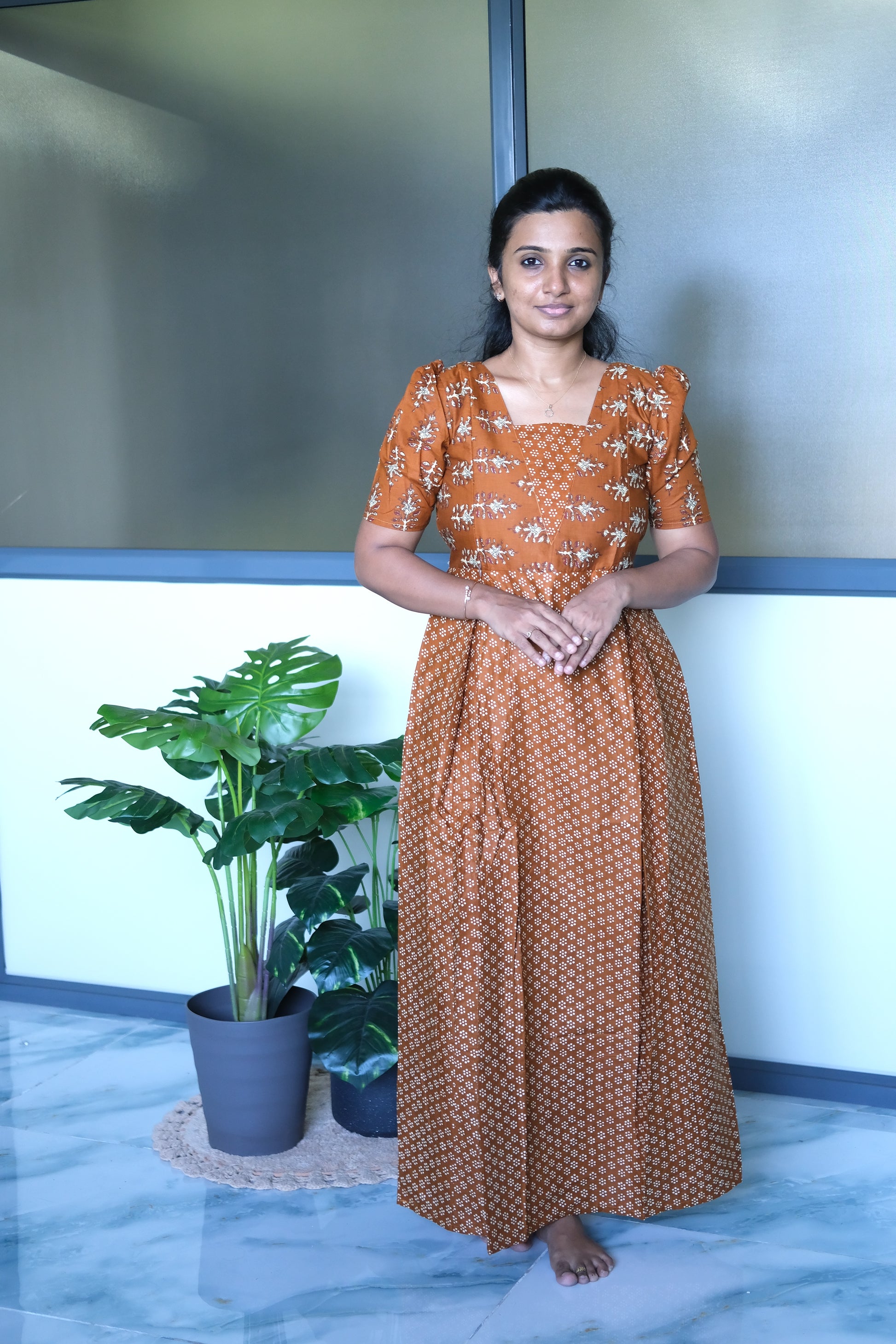 Mustard cotton feeding nighty with a square neckline, short puff sleeves, and embroidered yoke detailing.