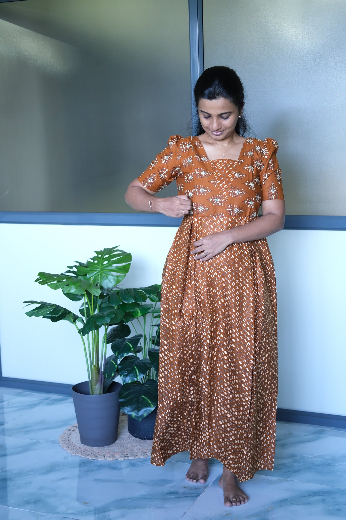 Close-up of the mustard maternity maxi nighty showing the functional side zipper design for nursing access.