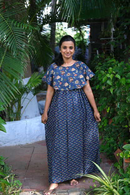 Full-length view of the dark blue cotton maxi nighty with a relaxed drape and floral patterns
