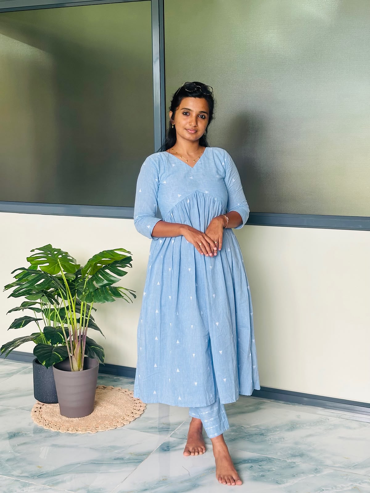Sky blue handloom cotton kurti set featuring an Alia cut silhouette with gathered waist and matching printed pants.