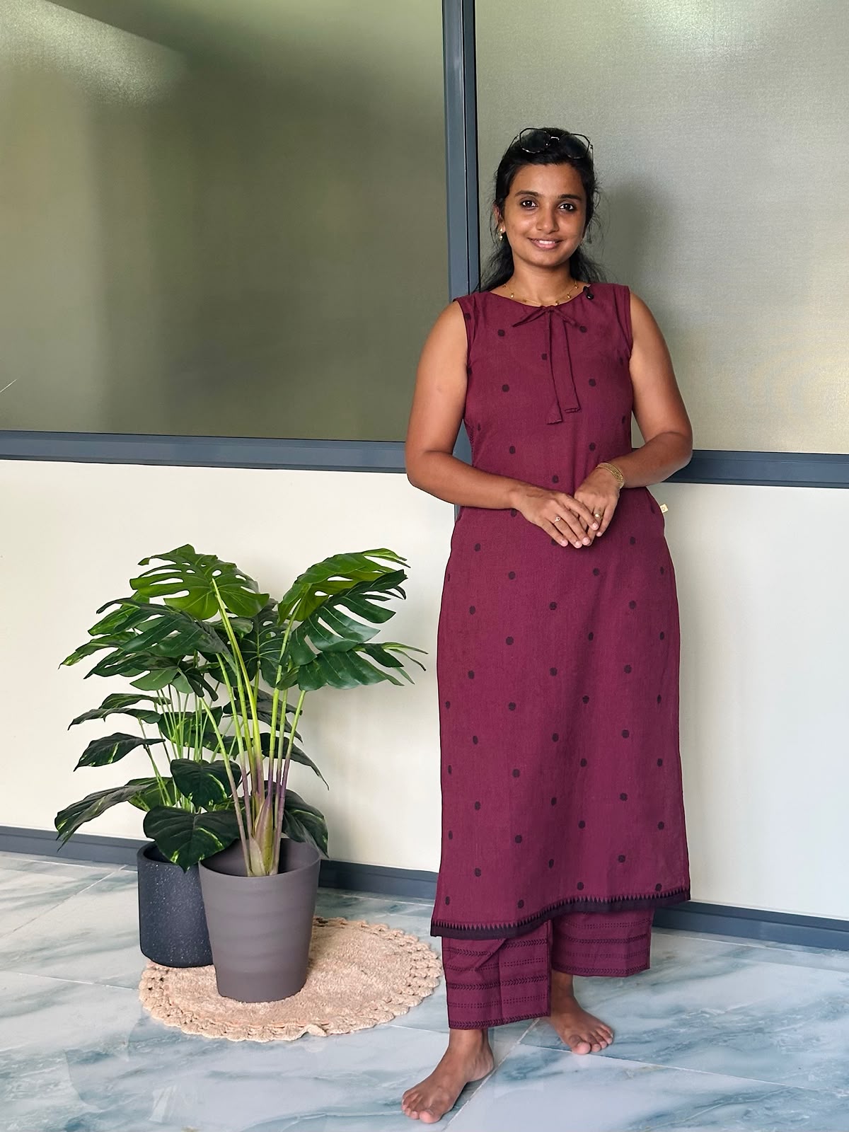 Sleeveless burgundy handloom cotton co-ord set in a relaxed fit with polka dot prints.