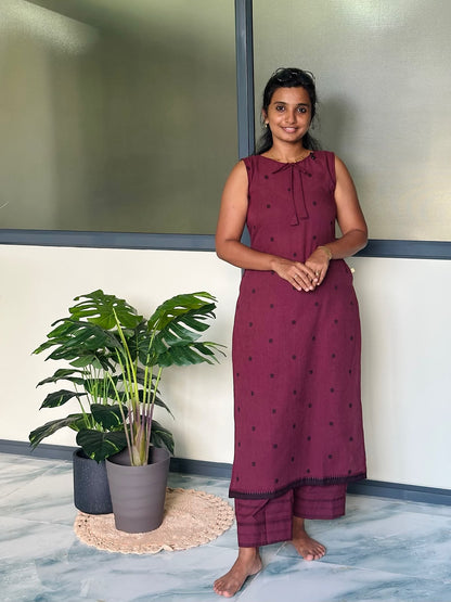 Sleeveless burgundy handloom cotton co-ord set in a relaxed fit with polka dot prints.