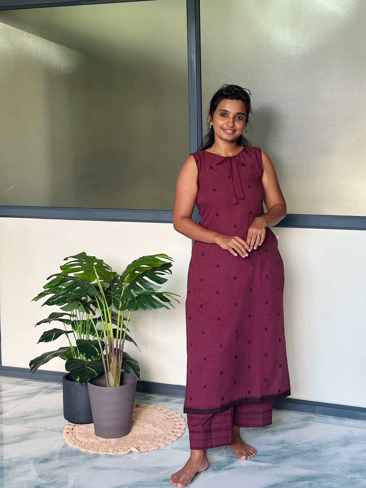 Reversible cotton kurti set with pants showing the polka dot side with a front tie-up neck detail.