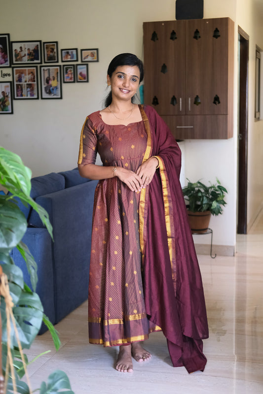 Golden maroon silk anarkali suit set with woven gold zari checks and matching zari border dupatta