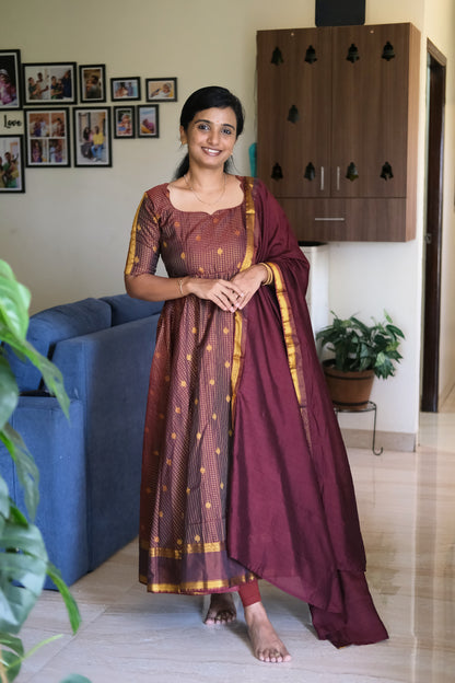 Ankle length maroon silk anarkali dress with modified sweetheart neckline and elbow sleeves