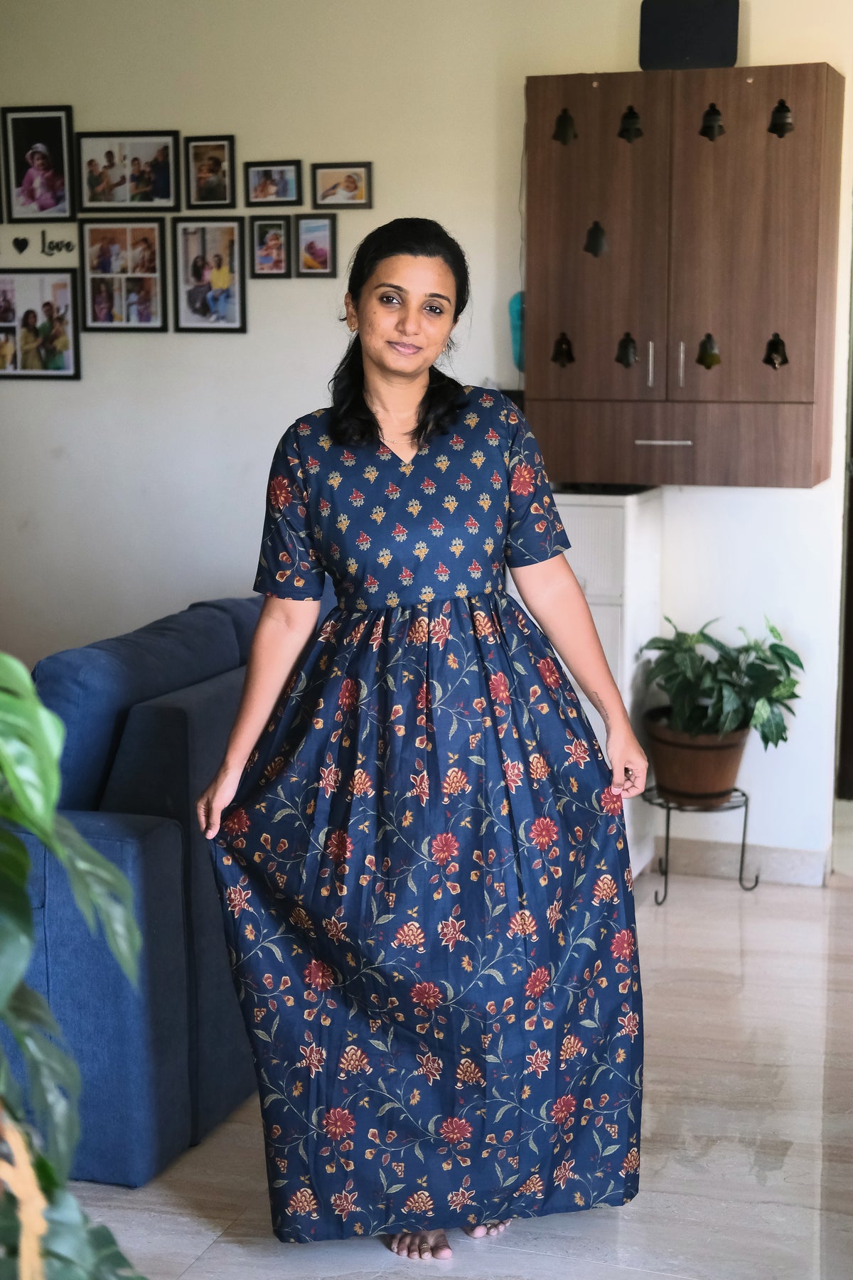 navy blue maternity maxi dress with gathered skirt and short sleeves