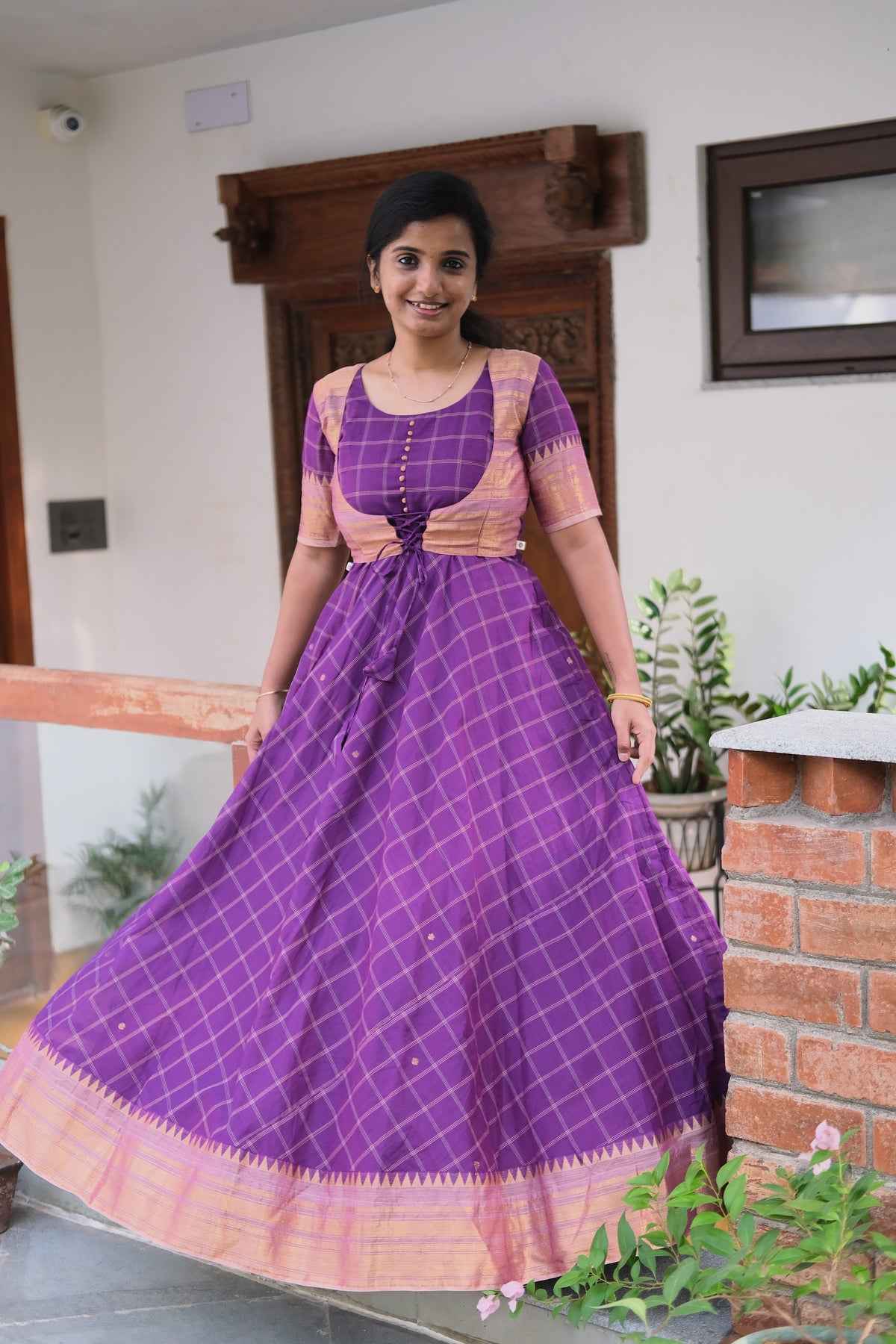 Flared violet Chettinad cotton maxi dress with temple borders
