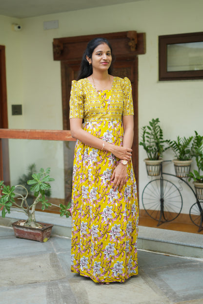 A relaxed fit mustard yellow cotton maxi nighty featuring a square neckline.