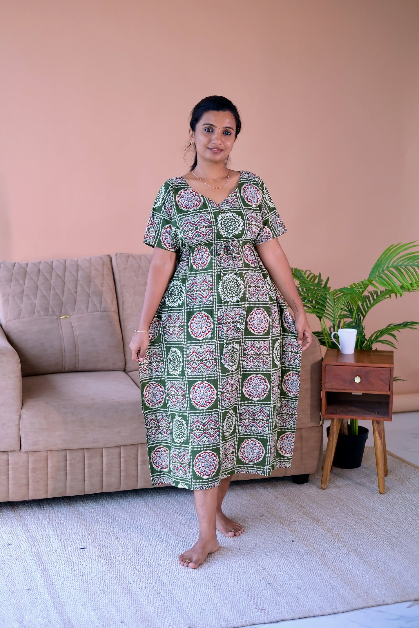 Green cotton kaftan nighty with traditional block prints and an adjustable drawstring waist.