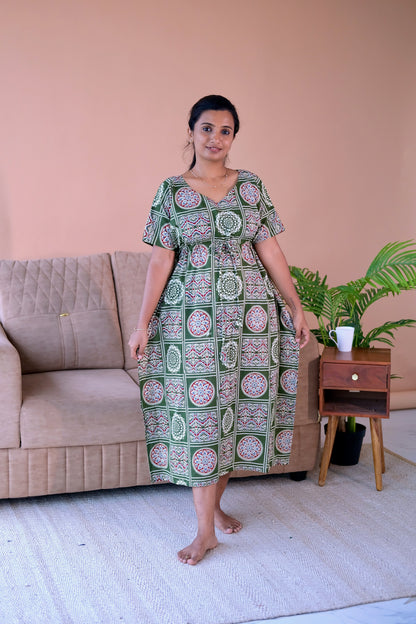 Green cotton kaftan nighty with traditional block prints and an adjustable drawstring waist.
