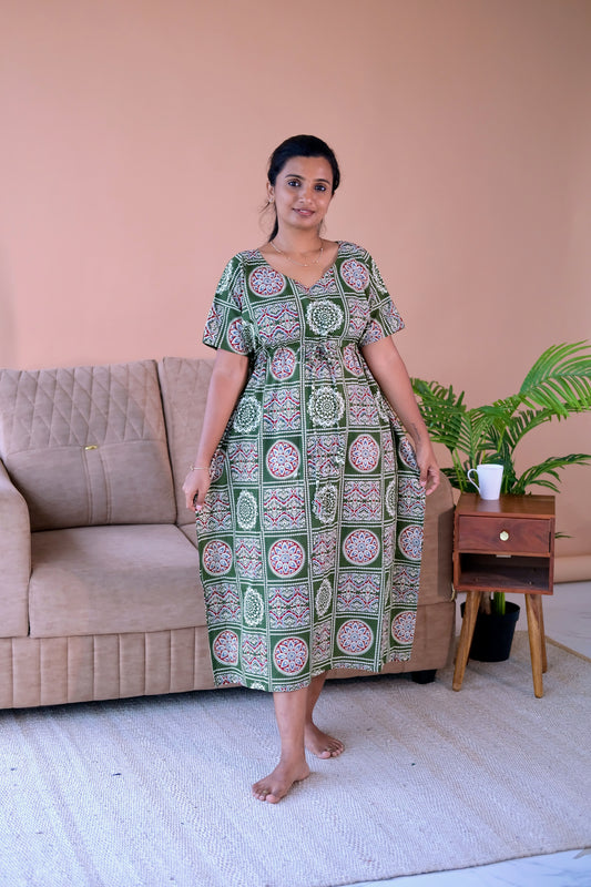Green cotton kaftan nighty with traditional block prints and an adjustable drawstring waist.