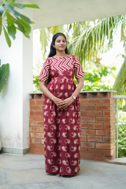 Maroon cotton maxi nighty with cream paisley print and chevron yoke details.