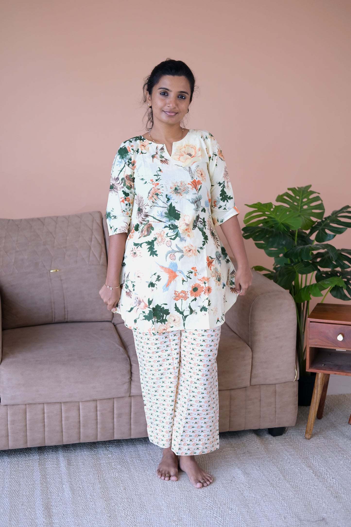 Close-up of the ivory cotton night suit for women showing the split neckline and soft, breathable fabric texture.