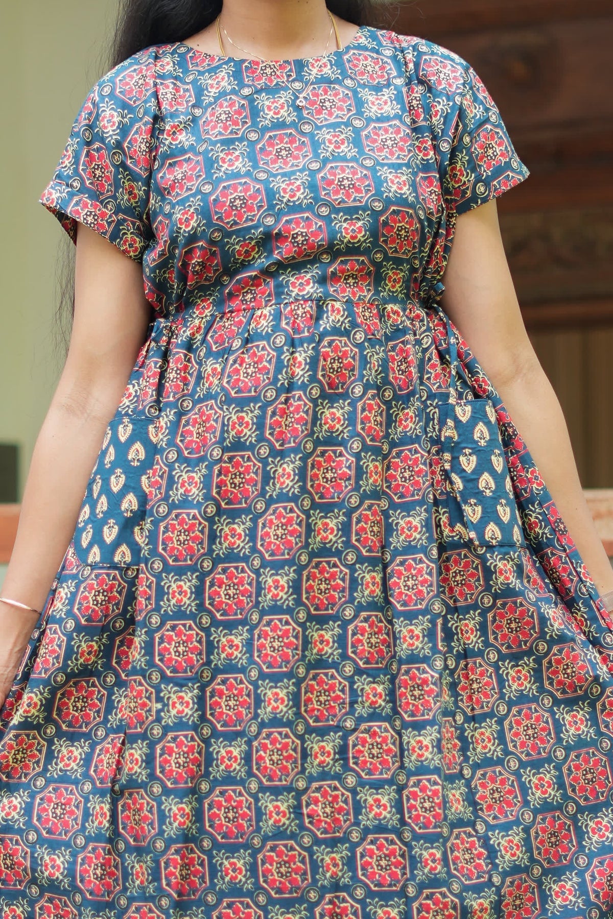 Close-up of the geometric print and pocket detail on the indigo blue cotton maxi nighty
