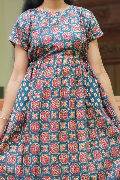 Close-up of the geometric print and pocket detail on the indigo blue cotton maxi nighty