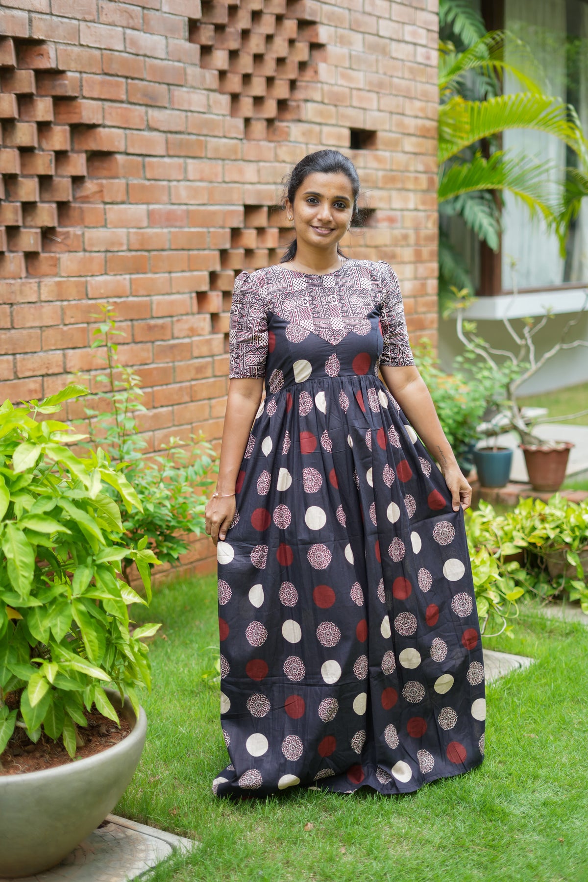Full-length view of the comfortable ladies cotton nighty in black with a relaxed fit.