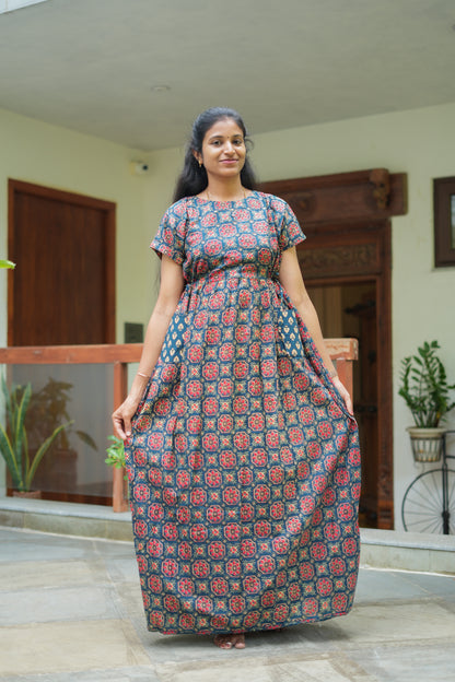Full-length view of a comfortable cotton maxi nighty in indigo blue with side pockets